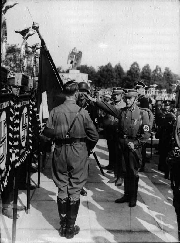Adolf Hitler consecrating the standards in Nuremberg's Luitpoldhain